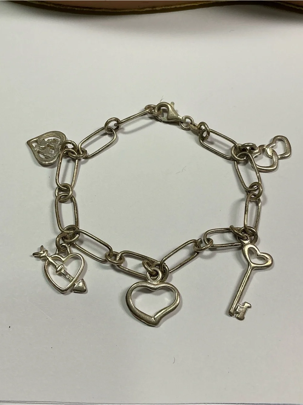 Sterling Silver Link Charm Bracelet W/ 5 Romantic Dangling Charms. 7.25” long